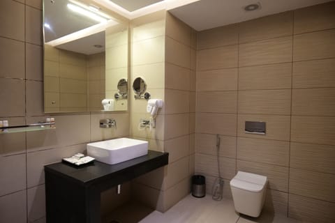 Classic Suite, 1 Bedroom, Balcony, Pool View | Bathroom | Shower, rainfall showerhead, hair dryer, bathrobes