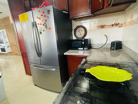 Condo, 3 Bedrooms, Smoking, Balcony | Private kitchen | Stovetop, coffee/tea maker