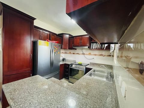 Condo, 3 Bedrooms, Smoking, Balcony | Private kitchen | Stovetop, coffee/tea maker