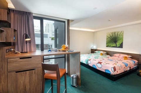 Family Room | Premium bedding, free minibar, in-room safe, individually decorated