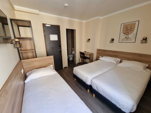 Triple Room | Premium bedding, soundproofing, free WiFi, bed sheets