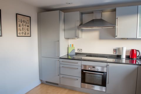 City Apartment | Private kitchen | Full-size fridge, microwave, oven, stovetop