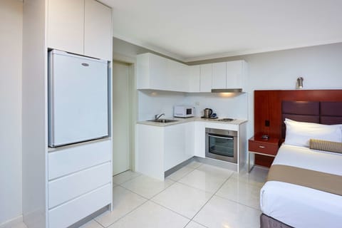 Deluxe Room, Multiple Beds, Non Smoking, Balcony | Private kitchen | Electric kettle