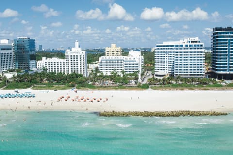 On the beach, sun loungers, beach towels