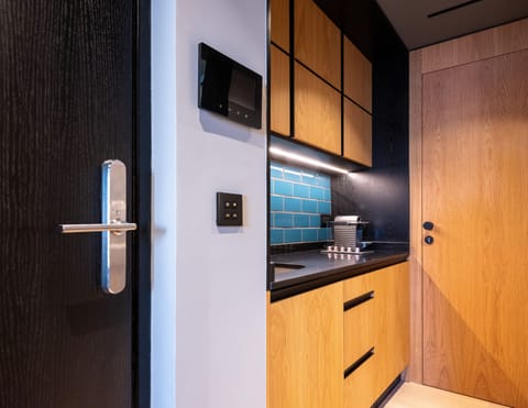 Premium City Escape Suite | Private kitchenette | Mini-fridge, coffee/tea maker, electric kettle, toaster