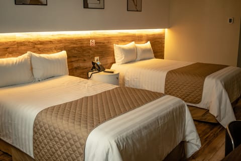 Standard Twin Room | Down comforters, minibar, individually decorated, individually furnished