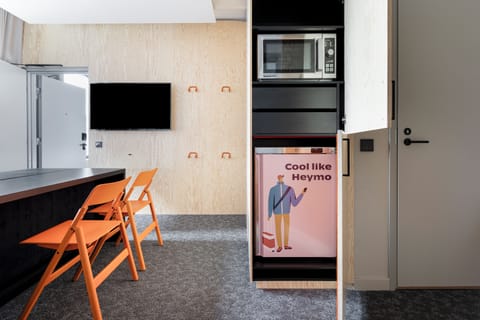 Room (Heymo) | Premium bedding, desk, laptop workspace, blackout drapes