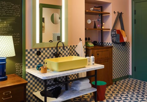 Shower, eco-friendly toiletries, hair dryer, towels