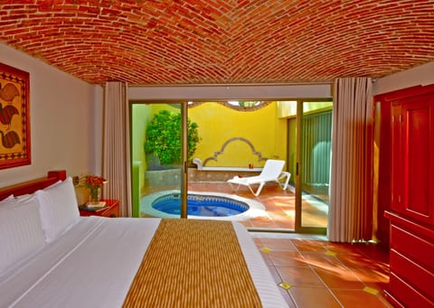 Suite, Private Pool | In-room safe, desk, laptop workspace, iron/ironing board