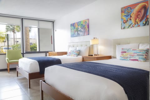 Family Suite, 2 Queen Beds | Minibar, in-room safe, individually decorated, individually furnished