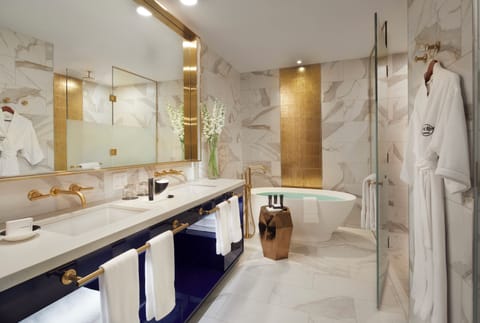 Suite (Platinum) | Bathroom | Shower, rainfall showerhead, hair dryer, bathrobes