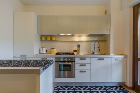 Classic Apartment | Private kitchen | Fridge, microwave, oven, stovetop