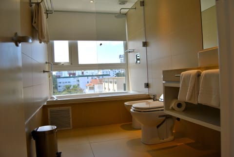 Executive Room, Hot Tub | Bathroom | Free toiletries, hair dryer, bidet, towels