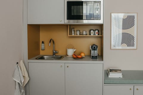 Standard Double Room | Private kitchen | Fridge, microwave, espresso maker, coffee/tea maker