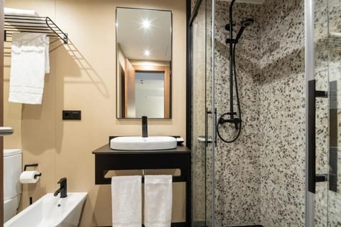 Superior Room | Bathroom | Towels, soap, shampoo, toilet paper