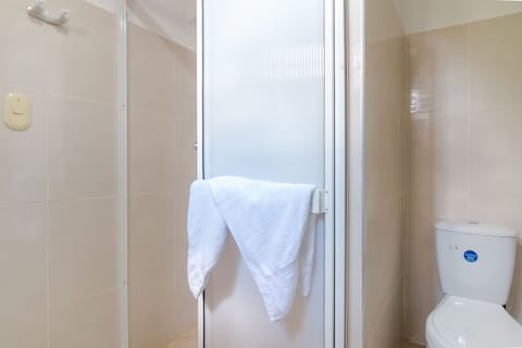 Double Room | Bathroom | Shower, free toiletries, towels, soap