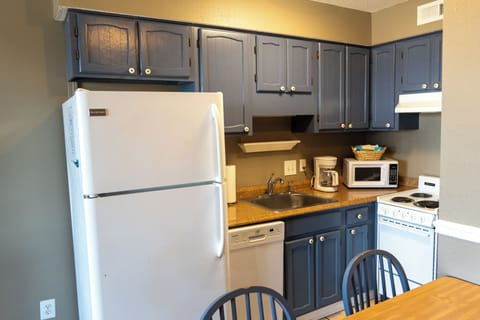 Classic Apartment, 2 Bedrooms | Private kitchen | Full-size fridge, microwave, oven, stovetop