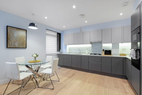 Elite Apartment | Private kitchen | Full-size fridge, microwave, oven, dishwasher