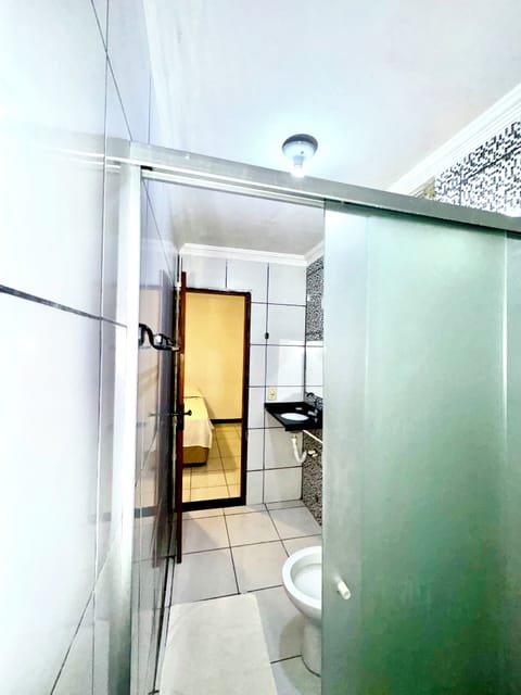 Standard Double Room | Bathroom | Shower, hair dryer, towels, soap