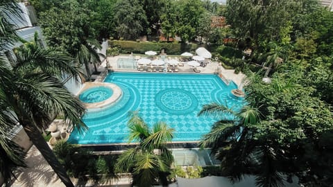 2 outdoor pools, open 8:00 AM to 7:30 PM, pool umbrellas, sun loungers