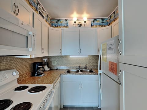 Condo, Multiple Beds, Balcony, Ocean View (Summit Beach Resort #315) | Private kitchen | Fridge, microwave, oven, stovetop