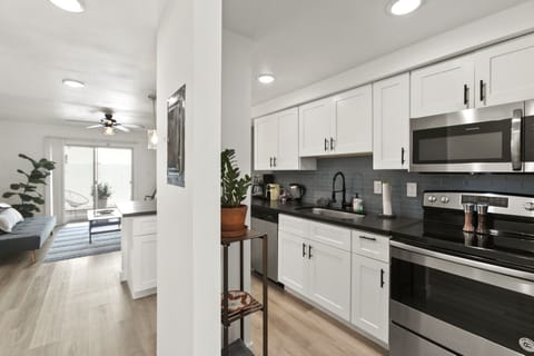 Luxury Apartment | Private kitchen | Full-size fridge, microwave, oven, stovetop