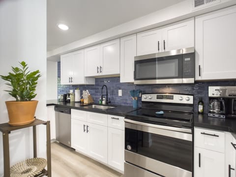 Comfort Apartment | Private kitchen | Full-size fridge, microwave, oven, stovetop