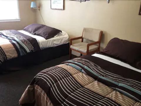 Basic Double Room, 2 Double Beds | In-room safe, individually decorated, individually furnished, desk