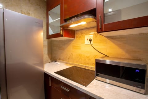 Premium Apartment, 1 Bedroom | Private kitchenette | Coffee/tea maker, electric kettle