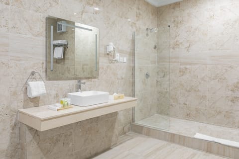 Deluxe Room | Bathroom | Separate tub and shower, deep soaking tub, rainfall showerhead