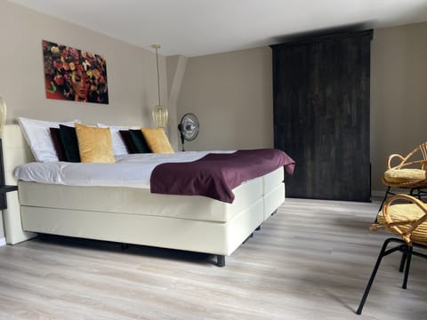 Deluxe Suite, Terrace | Memory foam beds, in-room safe, blackout drapes, iron/ironing board