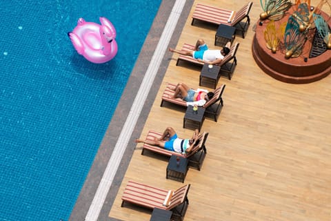 Outdoor pool, open 7:00 AM to 9:00 PM, sun loungers