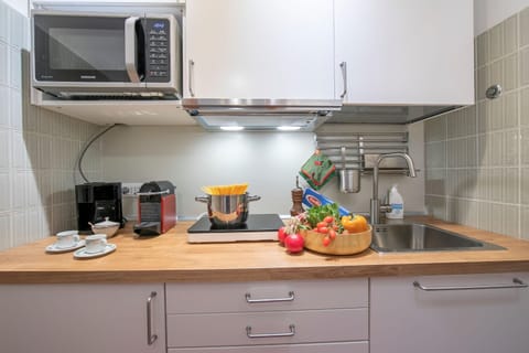 Family Apartment, 1 Bedroom (Il Nido Nella Pineta) | Private kitchenette | Fridge, microwave, stovetop, coffee/tea maker