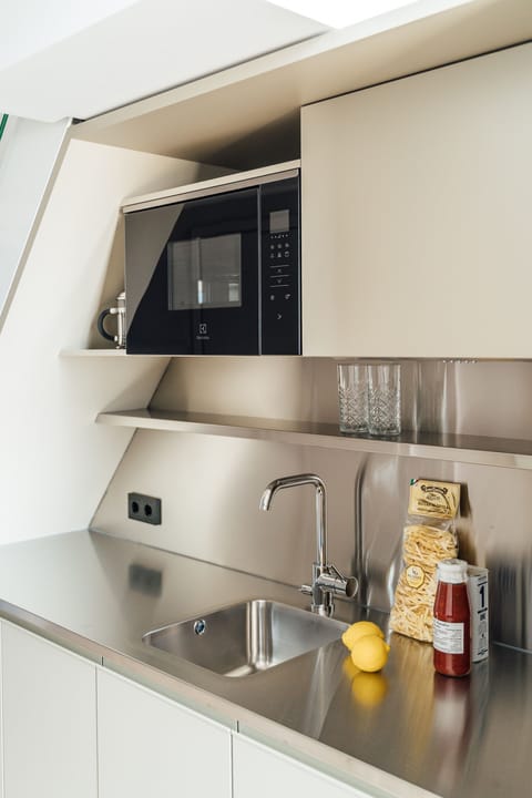 Deluxe Studio | Private kitchenette | Fridge, microwave, stovetop, coffee/tea maker