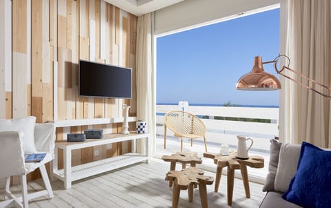 Superior Suite, Sea View | Living area | Flat-screen TV