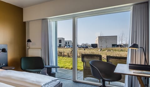 Standard Room, Partial Sea View | Premium bedding, desk, blackout drapes, iron/ironing board