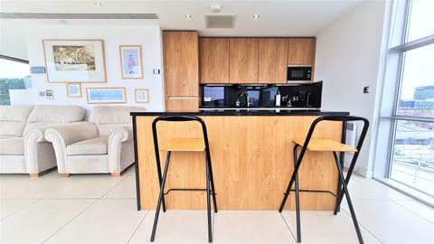 Premium Penthouse | Private kitchen | Fridge, microwave, oven, stovetop