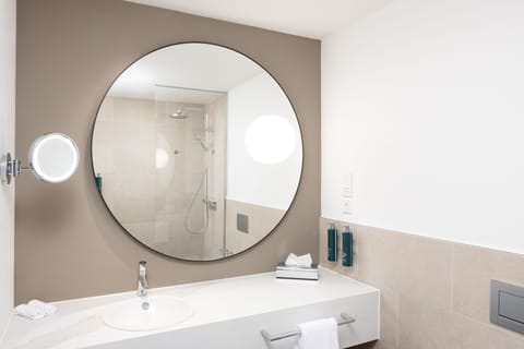 Combined shower/tub, free toiletries, hair dryer, bathrobes