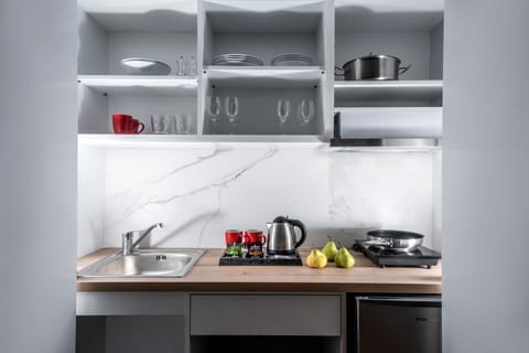 Fridge, microwave, coffee/tea maker, toaster