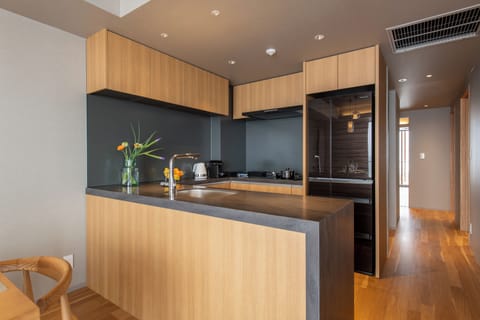 3 Bedroom Penthouse Suite | Private kitchen | Espresso maker, highchair