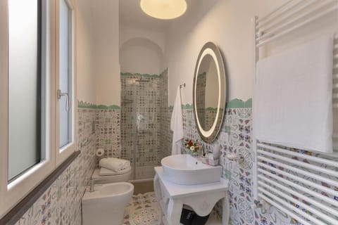 Luxury Room | Bathroom | Shower, rainfall showerhead, designer toiletries, hair dryer