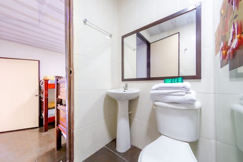 Standard Quadruple Room | Bathroom | Shower, designer toiletries, towels, soap