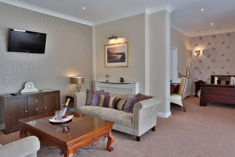 Suite, 1 Double Bed, Non Smoking | Desk, laptop workspace, iron/ironing board, free WiFi