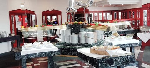 Daily buffet breakfast (EUR 21 per person)