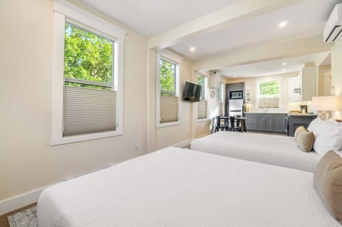 Deluxe Studio Suite, 2 Queen Beds, Kitchen, City View | Premium bedding, down comforters, memory foam beds