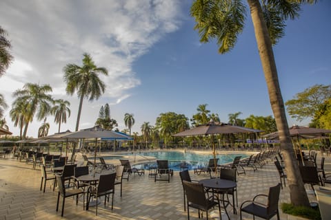 3 outdoor pools, open 10:00 AM to 10:00 PM, free cabanas, pool umbrellas