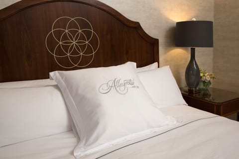 Premium bedding, down comforters, pillowtop beds, in-room safe