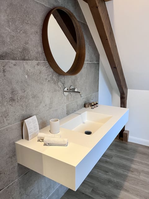 Signature Triple Room | Bathroom | Designer toiletries, hair dryer, towels, soap