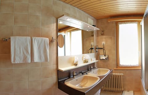 Superior Triple Room | Bathroom | Hair dryer, towels