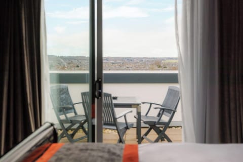 Suite | In-room safe, individually decorated, desk, blackout drapes